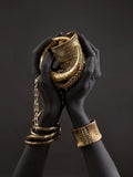 Hands Holding Jewelry