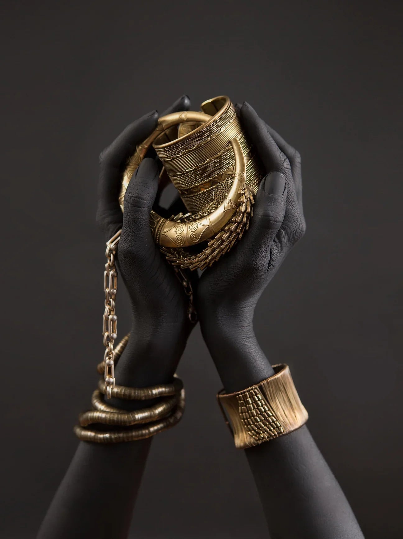 Hands Holding Jewelry